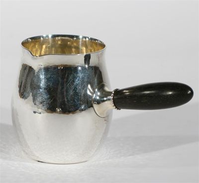 Appraisal: A Georg Jensen silver cream jug model C with ebonised