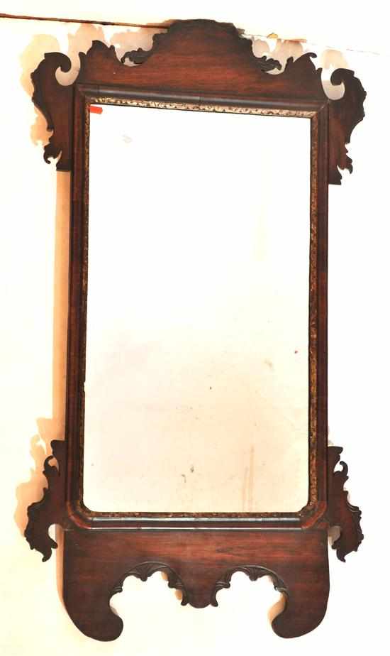 Appraisal: A th century mahogany framed wall mirror The rectangular plate