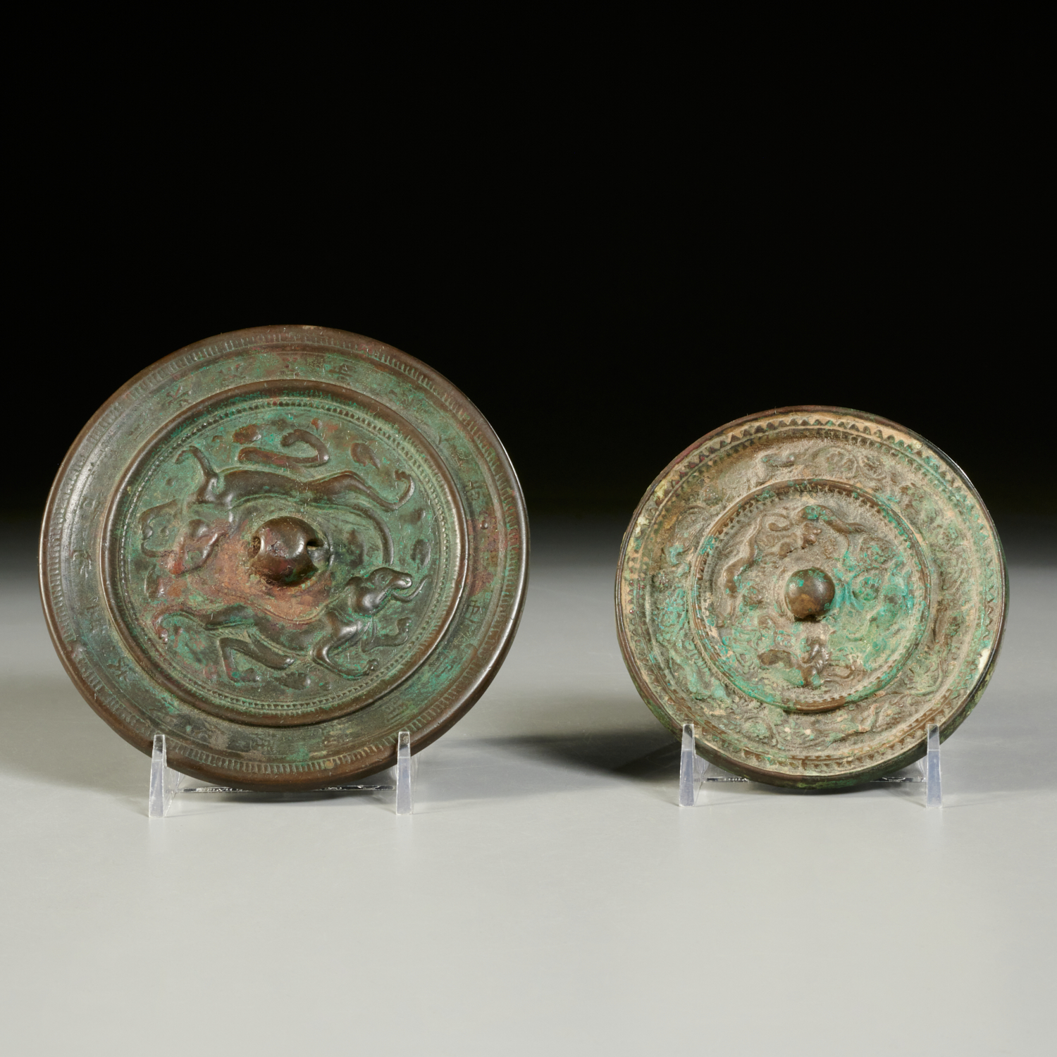 Appraisal: CHINESE BRONZE ROUND MIRRORS Possibly Tang Dynasty or older c