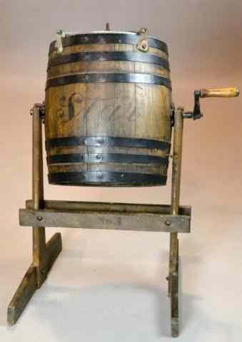 Appraisal: Antique Star Barrel Butter ChurnBarrel-shaped wooden centrifugal butter churn with