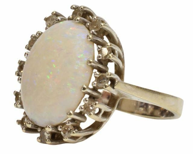 Appraisal: Estate kt white gold ring opal cabochon approx ct framed