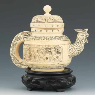 Appraisal: Chinese Ivory Carved Teapot Early th Century Squat form pot