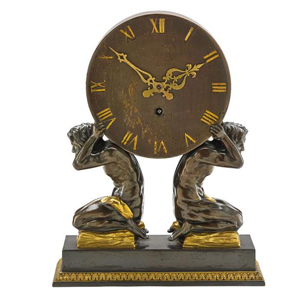 Appraisal: CHELSEA MANTLE CLOCK Pair of male figures supporting a clock