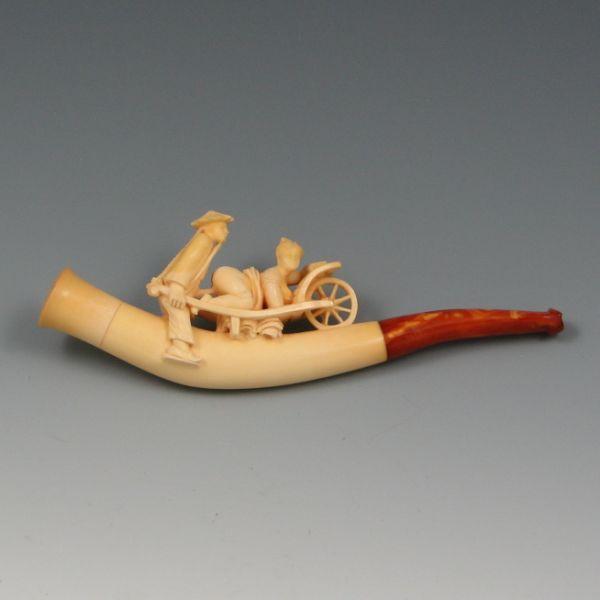 Appraisal: Erotic pipe in carved ivory and amber Excellent condition with