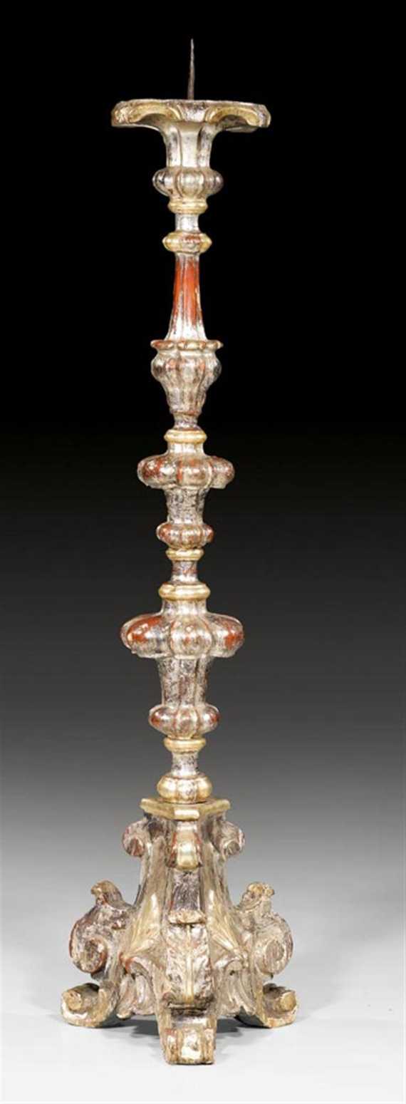 Appraisal: TALL CANDLEHOLDER Baroque probably northern Italy th century Shaped carved