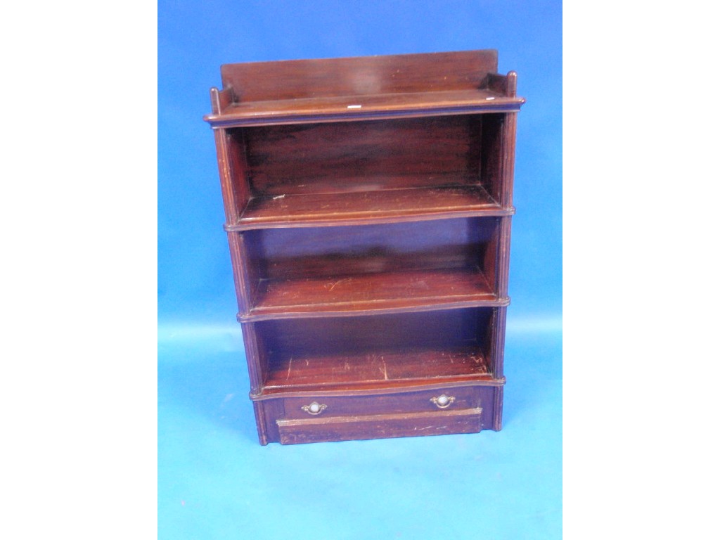 Appraisal: A late Victorian stained beech stacking bookcase with drawer base