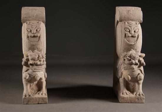 Appraisal: Pair of Chinese carved stone foo dog-form architectural ornaments late