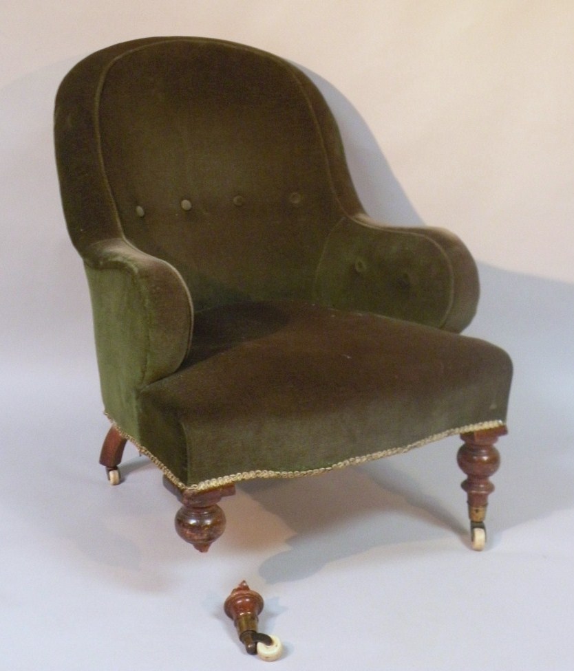 Appraisal: A late thC mahogany framed armchair overstuffed in later button