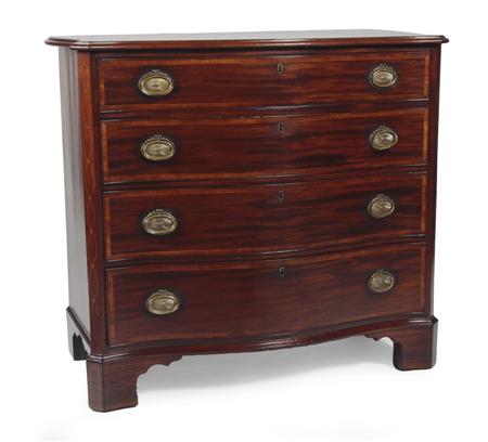 Appraisal: A George III mahogany and crossbanded serpentine chest of four