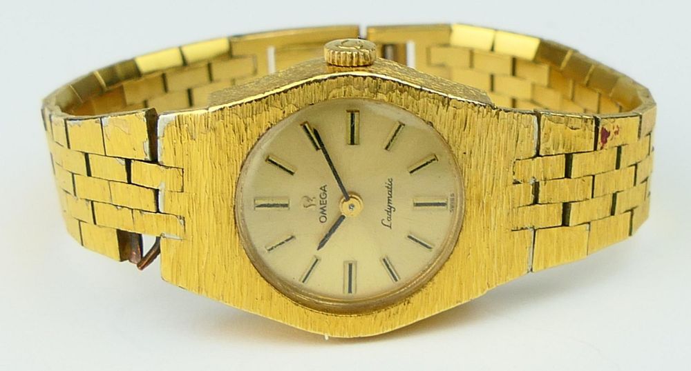 Appraisal: OMEGA KT Y BRUSHED GOLD LADYMATIC WATCH Band and case