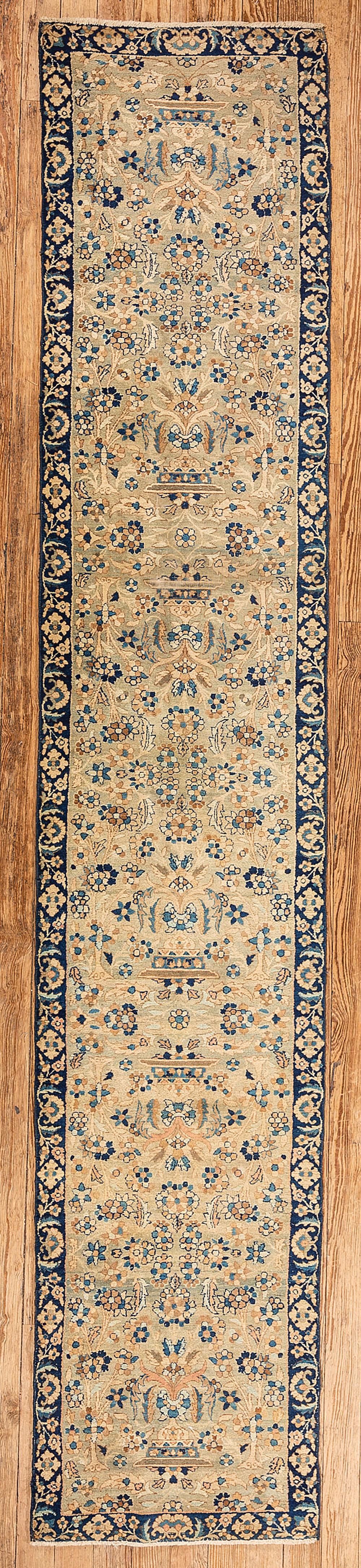 Appraisal: Kerman Runner allover design of flowers in blue and gold