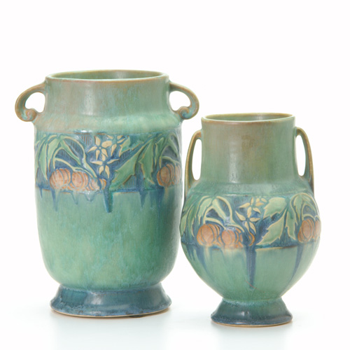 Appraisal: ROSEVILLE Two green Baneda vases one urn-shaped Nick to handle