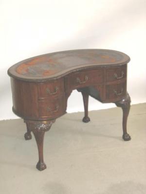 Appraisal: A LADY'S MAHOGANY WRITING DESK of kidney form the brown