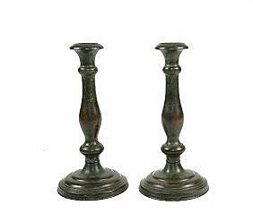 Appraisal: PAIR OF TIFFANY STUDIOS PATINATED BRONZE CANDLESTICKSCirca The underside marked