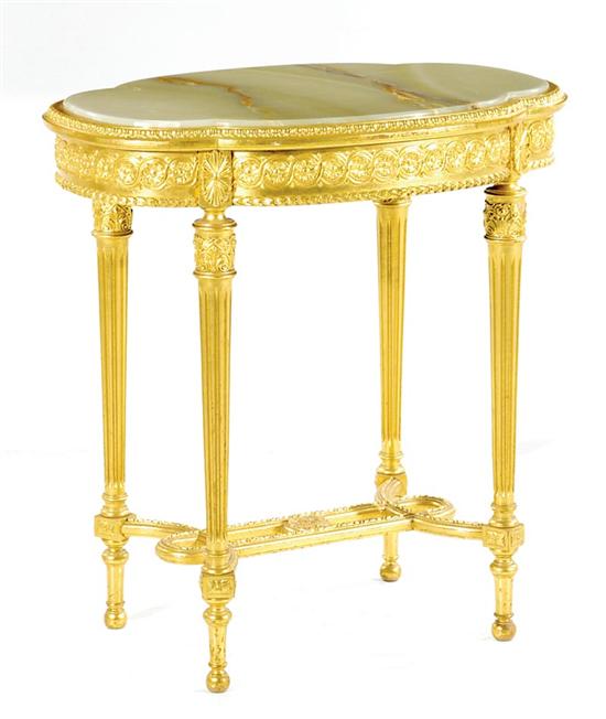 Appraisal: Louis XVI style gilded center table early th century shaped