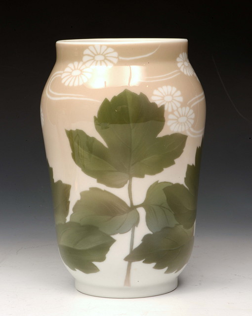 Appraisal: A Royal Copenhagen vase pre- decorated with flowers and leaves