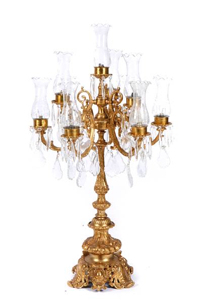 Appraisal: A pair of gilt bronze and crystal ten light candelabra