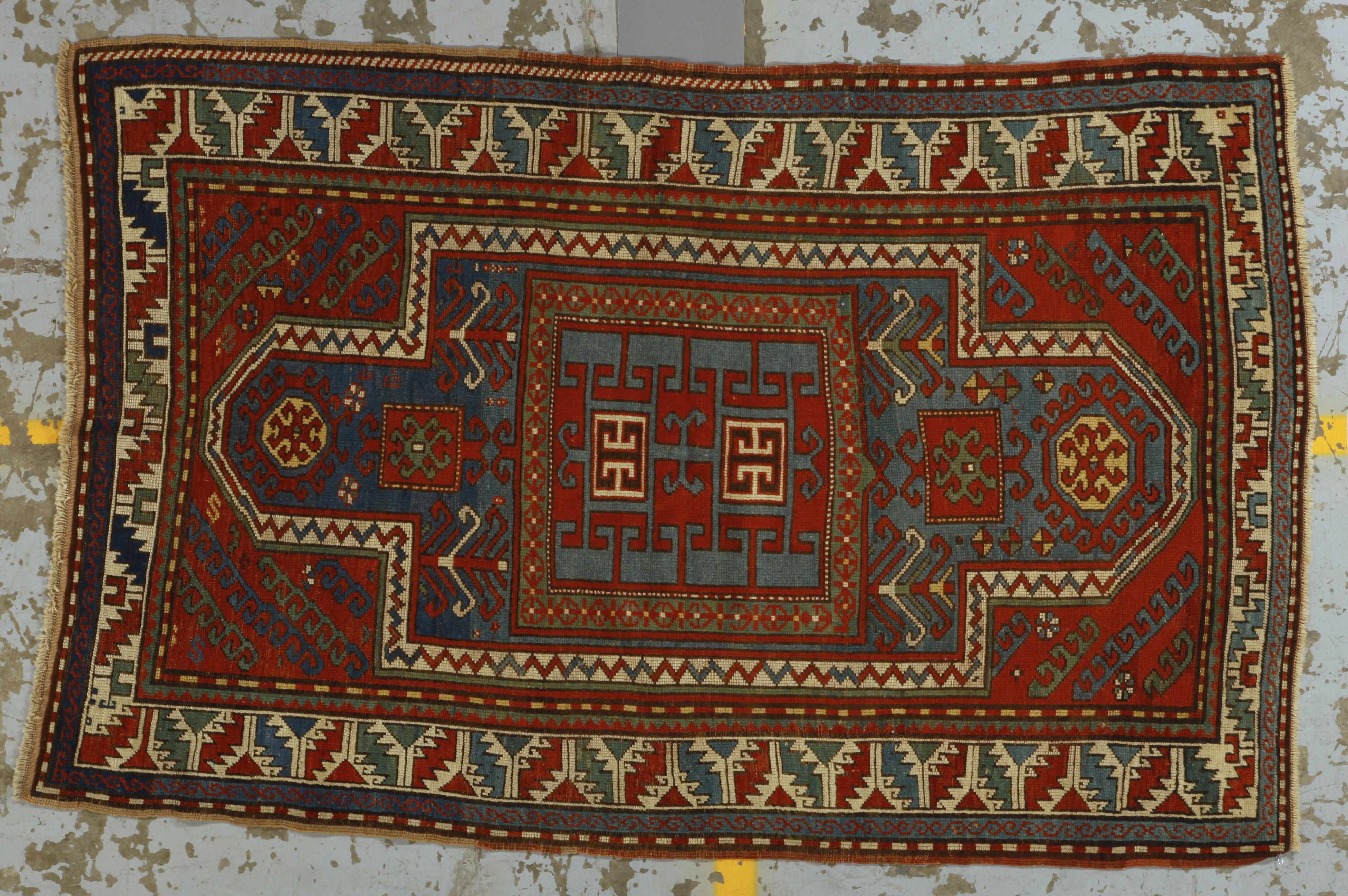 Appraisal: A Swan Kazak rug Caucasuslate th centurysize approximately ft in