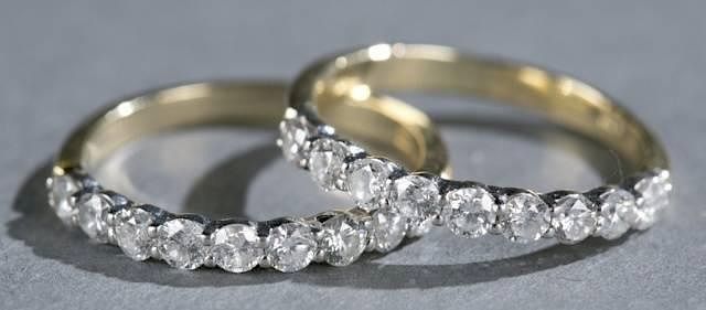 Appraisal: Pair of tcw diamond and kt gold bands A pair