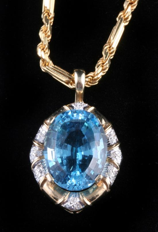 Appraisal: K YELLOW GOLD DIAMOND AND BLUE TOPAZ PENDANT ON YELLOW