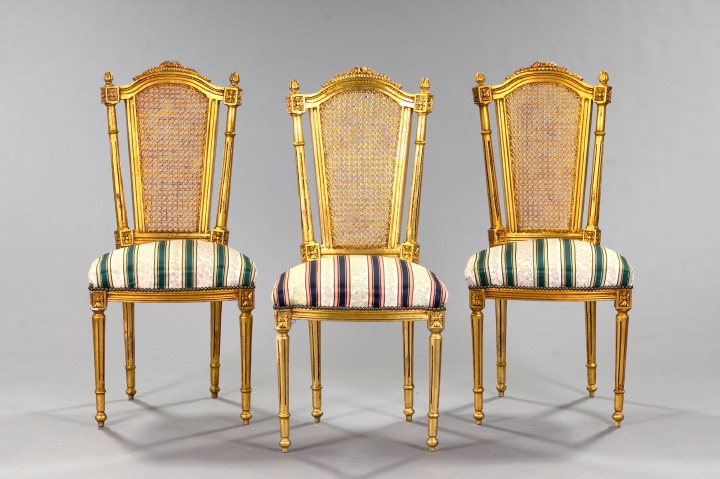 Appraisal: Suite of Three Louis XVI-Style Giltwood and Caned Back Sidechairs