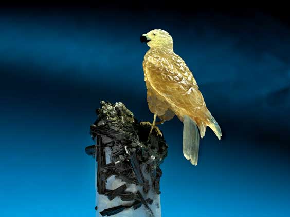 Appraisal: IMPOSING CITRINE FALCON ON VERY LARGE QUARTZ CRYSTAL WITH EPIDOTE