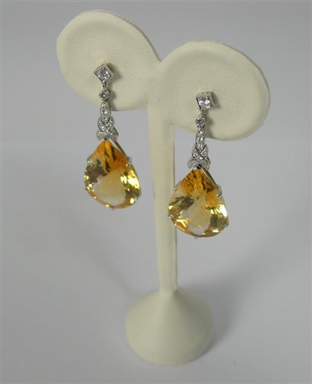 Appraisal: A pair of modern citrine and diamond pendant earrings each