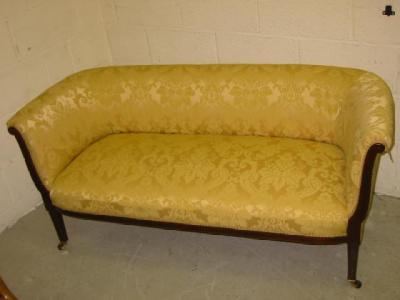 Appraisal: AN EDWARDIAN MAHOGANY FRAMED SOFA of Chesterfield type with stringing