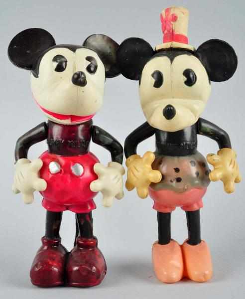 Appraisal: Celluloid Disney Mickey Minnie Standing Figures Description Larger size variation