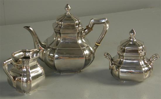 Appraisal: Continental three piece tea service of square form with shaped