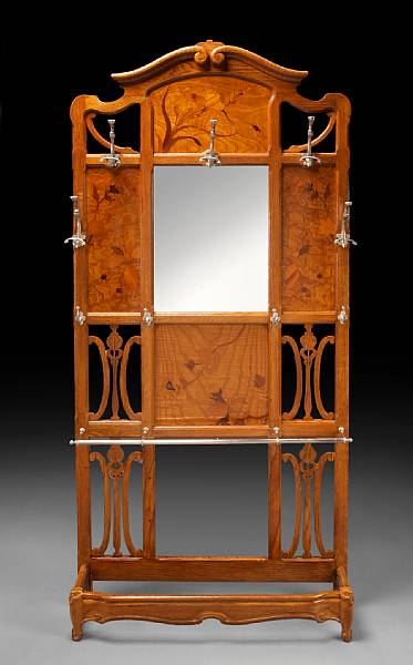 Appraisal: An Art Nouveau marquetry hall tree circa With silvered metal