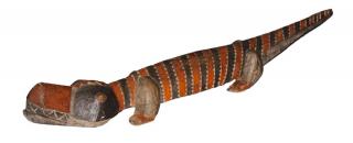 Appraisal: A Carved and Polychromed African Crocodile Attractively carved with a