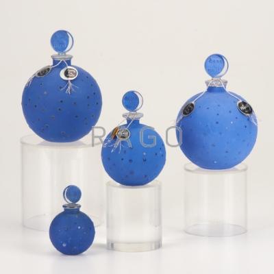 Appraisal: LALIQUE Four Dans La Nuit blue perfume bottles th c