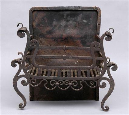 Appraisal: FRENCH WROUGHT-IRON FIREGRATE Plain back and slated basket on s-scroll