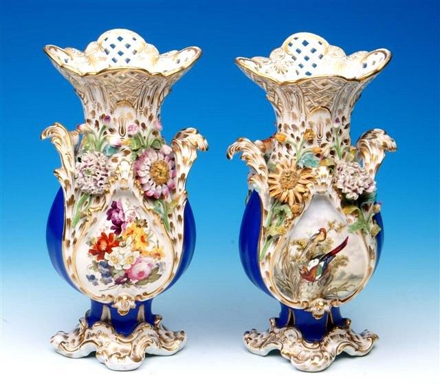 Appraisal: A pair of th Century porcelain vases each with pierced