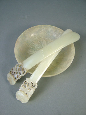 Appraisal: An Indian celadon jade circular dish with foliate carved decoration