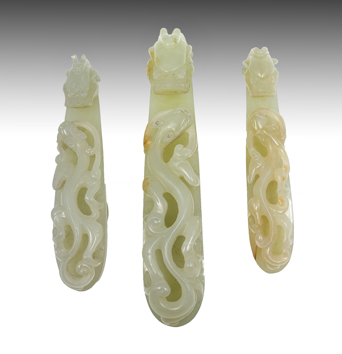 Appraisal: PIECE DRAGON JADE BELT BUCKLES - Finely carved Qing dynasty