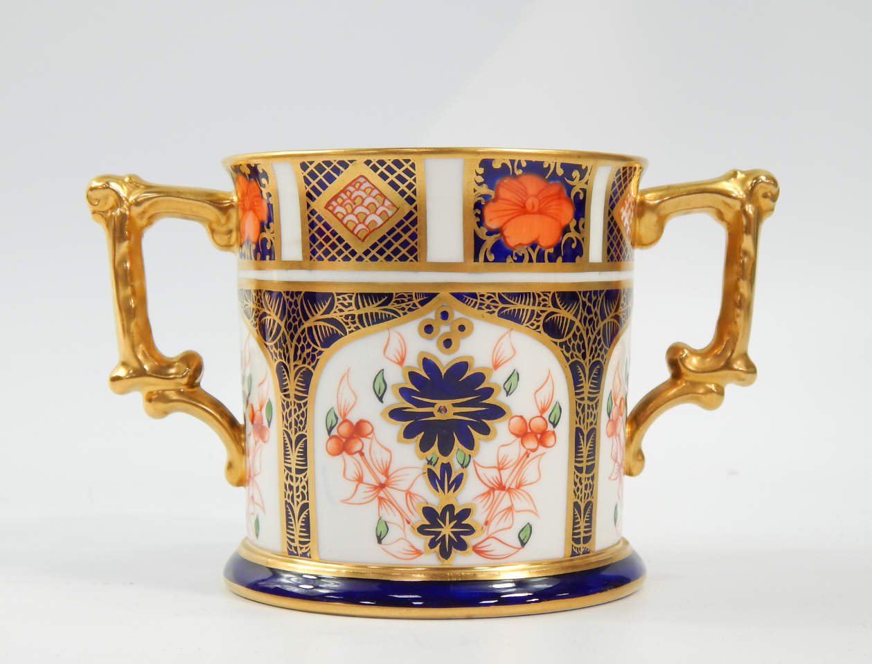 Appraisal: A Royal Crown Derby porcelain Imari loving cup decorated in