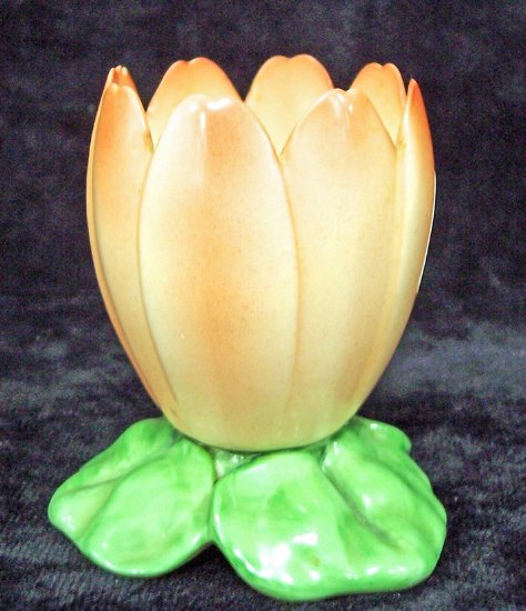 Appraisal: A Royal Worcester waterlily vase in orange and green cm