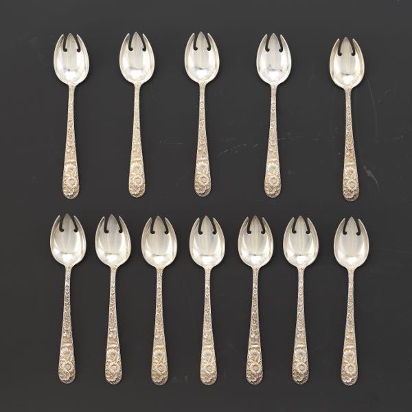 Appraisal: TWELVE KIRK ICE CREAM SPOON FORKS Rose pattern repousse ice