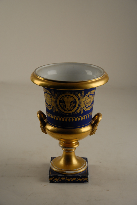 Appraisal: A th C Urn cobalt blue and gilt porcelain cylinder