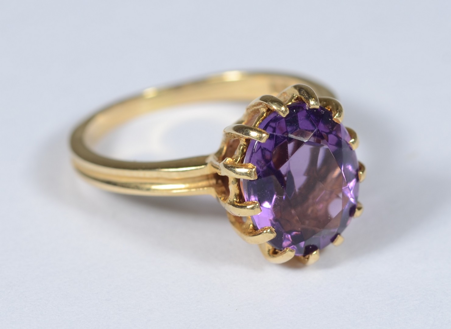 Appraisal: K YG oval synthetic amethyst ring mm x mm size