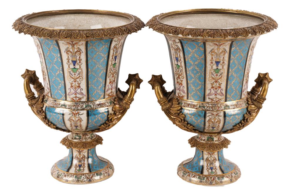 Appraisal: PAIR OF GILT METAL-MOUNTED PORCELAIN URNSsecond half th century mark