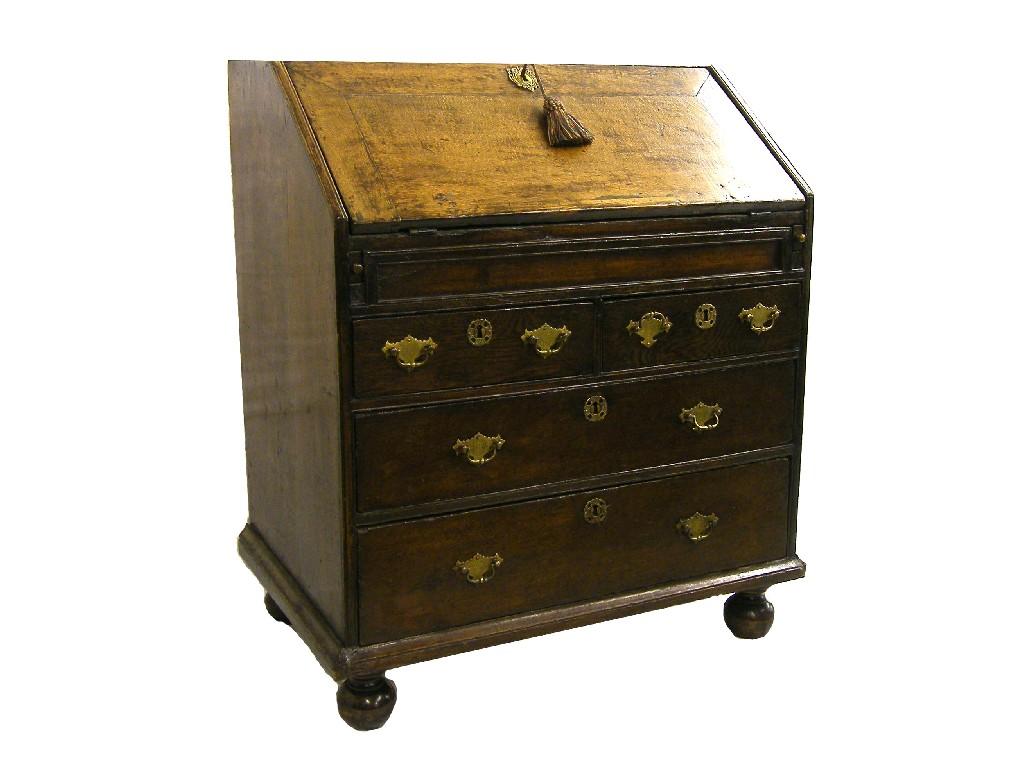 Appraisal: Small th century oak bureau the fall front opening to