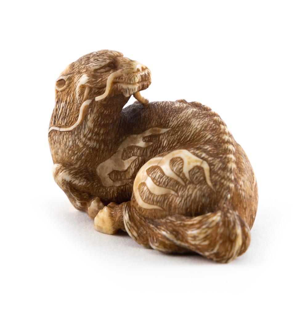 Appraisal: JAPANESE CARVED IVORY NETSUKE BY MASASADA TH CENTURYJAPANESE CARVED IVORY