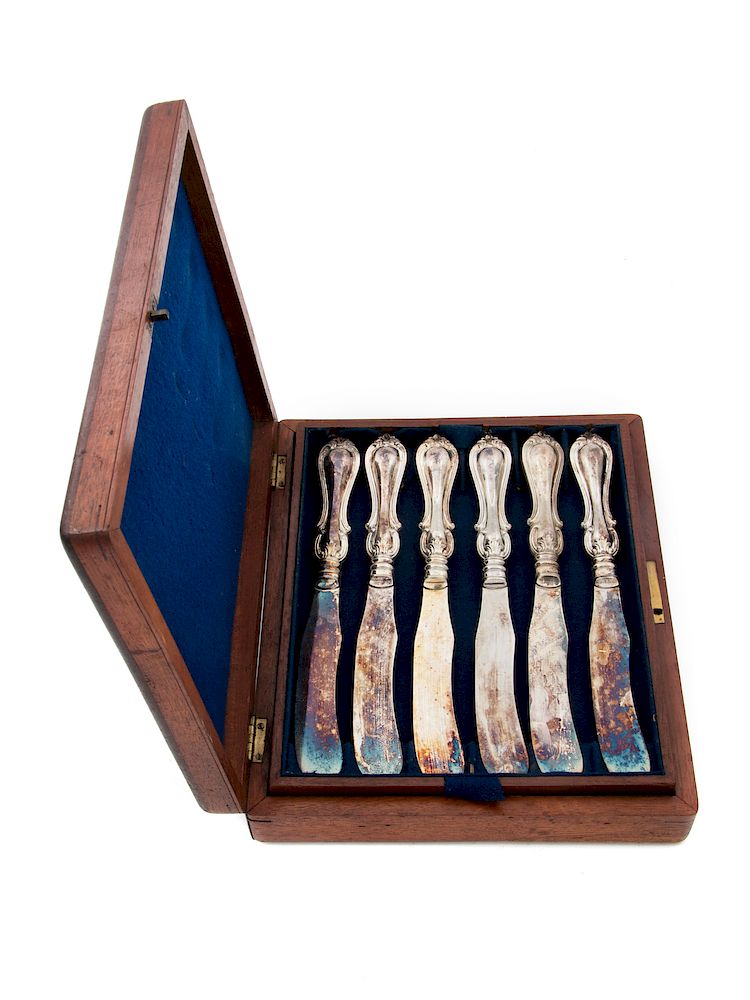 Appraisal: An English Cased Set of Silver-Plate Knives An English Cased