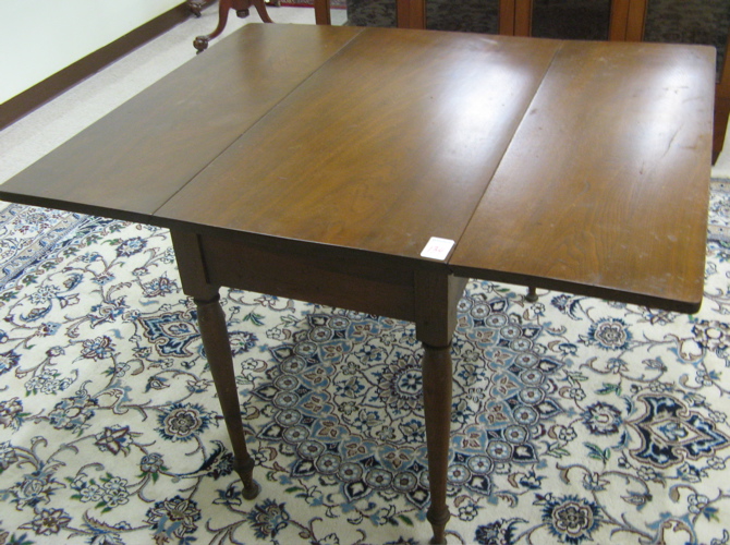 Appraisal: VICTORIAN DROP-LEAF WALNUT BREAKFAST TABLE American last quarter of the