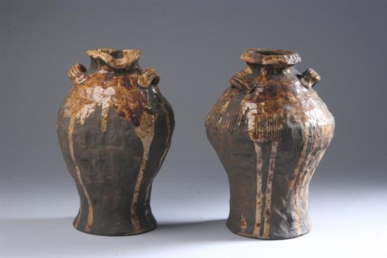 Appraisal: TWO JAPANESE STUDIO BROWN GLAZED VASES One baluster-form with three