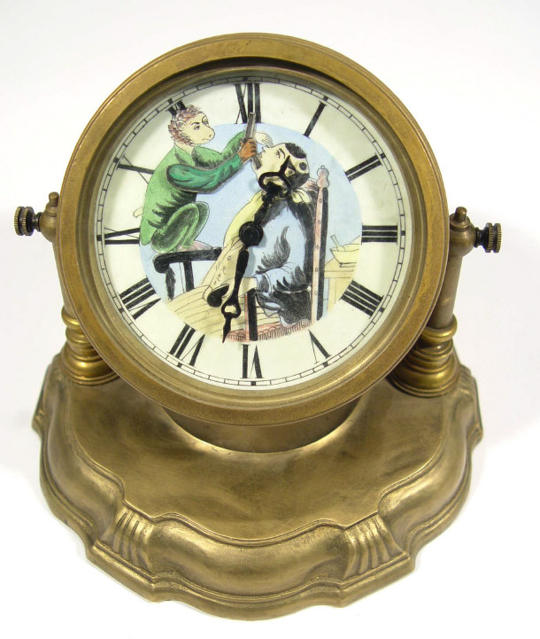 Appraisal: Brass cased clock the enamelled dial painted with a monkey