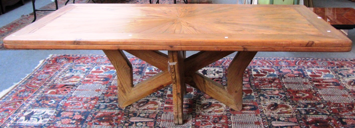 Appraisal: A pitch pine dining table the rectangular stella cut top